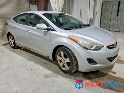 Czwarte zdjęcie samochodu z boku: 2011 HYUNDAI ELANTRA GLS VIN:5NPDH4AE3BH002553 - miniatura
