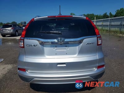 Zdjęcie 6 z 14 samochodu: 2016 HONDA CR-V EXL VIN:2HKRM4H77GH660652 - miniatura
