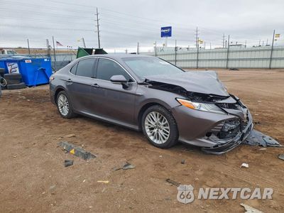 Czwarte zdjęcie samochodu z boku: 2018 TOYOTA CAMRY HYBRID XLE VIN:4T1B21HK3JU505826 - miniatura