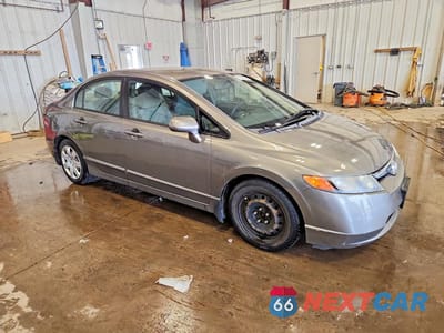 Czwarte zdjęcie samochodu z boku: 2007 HONDA CIVIC LX VIN:1HGFA16527L031132 - miniatura