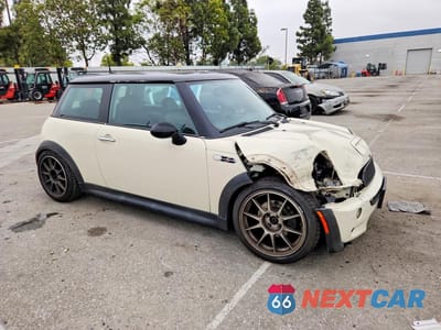 Czwarte zdjęcie samochodu z boku: 2005 MINI COOPER S VIN:WMWRE33455TD92763 - miniatura