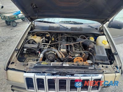 Zdjęcie 11 z 12 samochodu: 1998 JEEP GRAND CHEROKEE LAREDO VIN:1J4GZ58S4WC270230 - miniatura