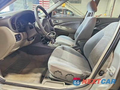 Zdjęcie 7 z 12 samochodu: 2001 NISSAN SENTRA XE VIN:3N1CB51DX1L467522 - miniatura