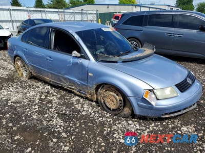 Czwarte zdjęcie samochodu z boku: 1999 VOLKSWAGEN PASSAT GLS VIN:WVWMA63B7XE173364 - miniatura