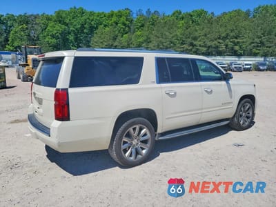 Trzecie zdjęcie samochodu z tyłu: 2015 CHEVROLET SUBURBAN K1500 LTZ VIN:1GNSKKKCXFR289552 - miniatura
