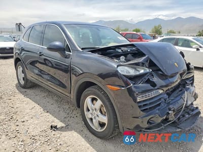 Czwarte zdjęcie samochodu z boku: 2012 PORSCHE CAYENNE S HYBRID VIN:WP1AE2A25CLA90118 - miniatura