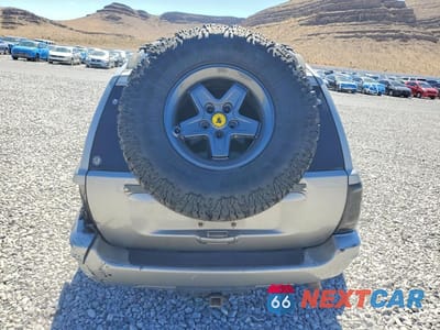 Zdjęcie 6 z 13 samochodu: 2000 JEEP GRAND CHEROKEE LIMITED VIN:1J4GW58N0YC359038 - miniatura