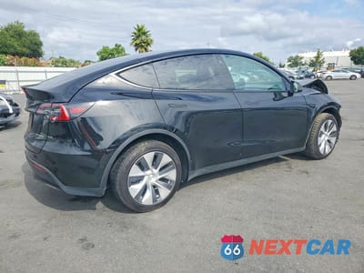 Trzecie zdjęcie samochodu z tyłu: 2022 TESLA MODEL Y VIN:7SAYGDEEXNF514167 - miniatura