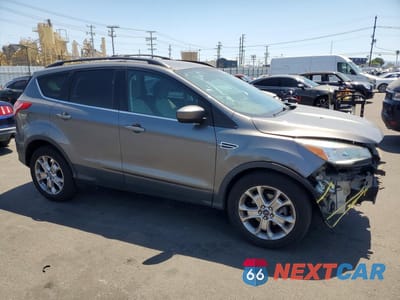 Czwarte zdjęcie samochodu z boku: 2013 FORD ESCAPE SE VIN:1FMCU9G93DUB50835 - miniatura