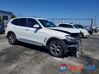 Czwarte zdjęcie samochodu z boku: 2021 BMW X3 SDRIVE30I VIN:5UXTY3C00M9H83259 - miniatura
