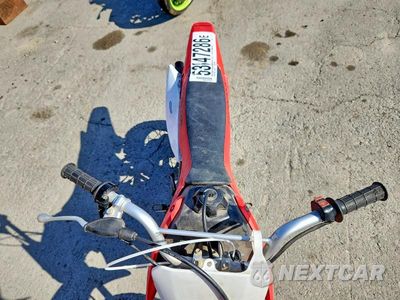 Piąte zdjęcie samochodu w środku: 2005 HOND-HONDA CRF 70 VIN:JH2DE02045K807026 - miniatura
