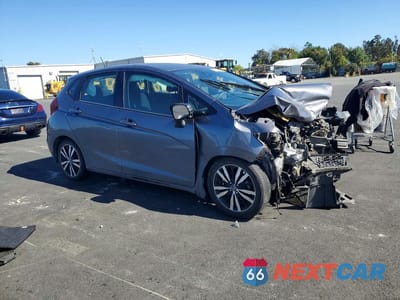 Czwarte zdjęcie samochodu z boku: 2019 HONDA FIT EX VIN:3HGGK5H87KM713916 - miniatura