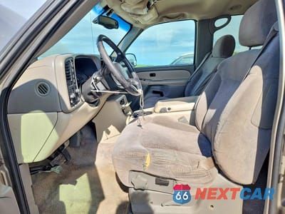 Zdjęcie 7 z 13 samochodu: 2001 CHEVROLET SUBURBAN K1500 VIN:3GNFK16T11G115481 - miniatura