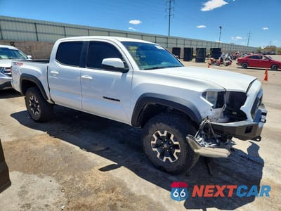 Czwarte zdjęcie samochodu z boku: 2022 TOYOTA TACOMA TRD OFF-ROAD VIN:3TMCZ5AN9NM470364 - miniatura