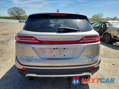 Zdjęcie 6 z 13 samochodu: 2015 LINCOLN MKC VIN:5LMCJ1A9XFUJ10142 - miniatura