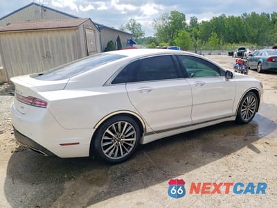 Trzecie zdjęcie samochodu z tyłu: 2017 LINCOLN MKZ PREMIERE VIN:3LN6L5A95HR614139 - miniatura