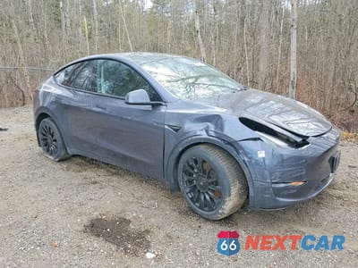Czwarte zdjęcie samochodu z boku: 2023 TESLA MODEL Y VIN:LRWYGDEE1PC162543 - miniatura
