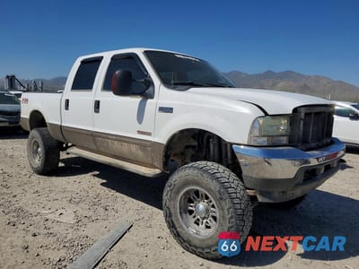 Czwarte zdjęcie samochodu z boku: 2004 FORD F350 SRW SUPER DUTY VIN:1FTSW31P54EE02433 - miniatura