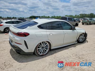 Trzecie zdjęcie samochodu z tyłu: 2022 BMW X6 XDRIVE40I VIN:5UXCY6C08N9K78067 - miniatura