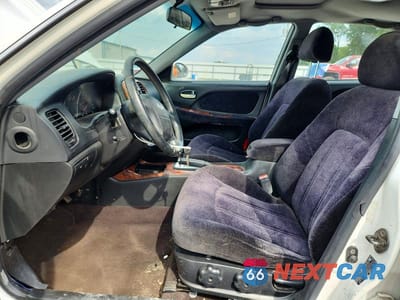 Zdjęcie 7 z 12 samochodu: 2002 HYUNDAI SONATA GLS VIN:KMHWF35H62A649352 - miniatura