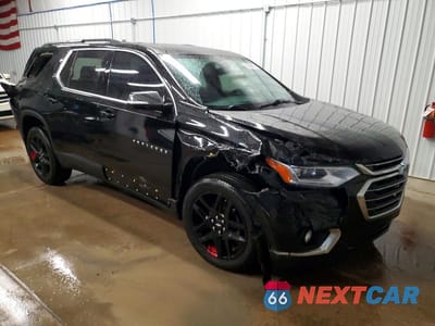 Czwarte zdjęcie samochodu z boku: 2019 CHEVROLET TRAVERSE LT VIN:1GNEVGKW0KJ303835 - miniatura