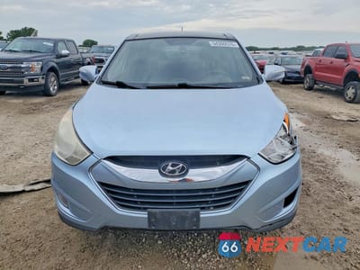 Piąte zdjęcie samochodu w środku: 2010 HYUNDAI TUCSON VIN:KM8JU3AC8AU064473 - miniatura