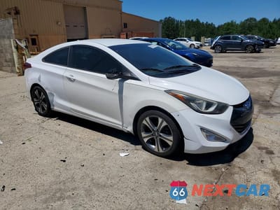 Czwarte zdjęcie samochodu z boku: 2014 HYUNDAI ELANTRA COUPE BASE VIN:KMHDH6AH6EU029595 - miniatura