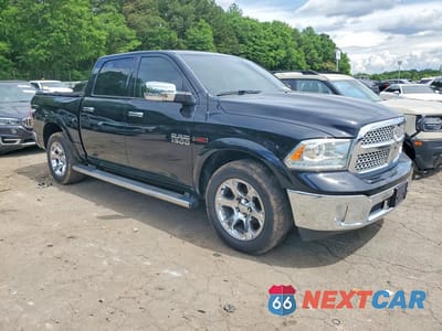 Czwarte zdjęcie samochodu z boku: 2014 RAM 1500 LARAMIE VIN:1C6RR6NM1ES319888 - miniatura