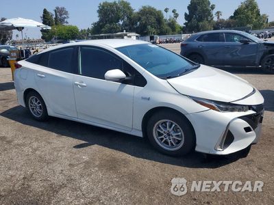 Czwarte zdjęcie samochodu z boku: 2021 TOYOTA PRIUS PRIME LE VIN:JTDKAMFP5M3175754 - miniatura
