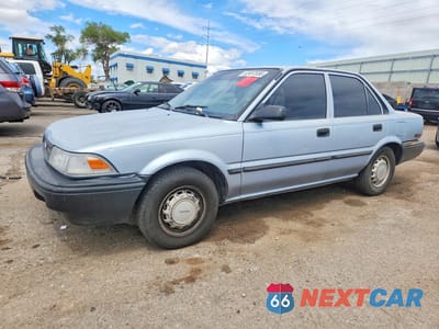 1990 TOYOTA COROLLA DLX 1NXAE94A6LZ086839 - główne zdjęcie licytacji z USA - miniatura