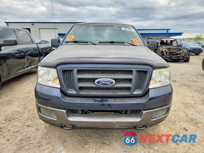 Piąte zdjęcie samochodu w środku: 2004 FORD F150 VIN:1FTPX14514NC18382 - miniatura