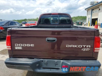 Zdjęcie 10 z 12 samochodu: 2004 DODGE DAKOTA SXT VIN:1D7FL16K94S593339 - miniatura