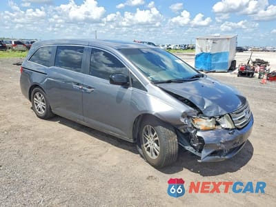 Czwarte zdjęcie samochodu z boku: 2011 HONDA ODYSSEY EXL VIN:5FNRL5H69BB077880 - miniatura
