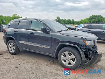 Czwarte zdjęcie samochodu z boku: 2011 JEEP GRAND CHEROKEE LAREDO VIN:1J4RR4GG8BC608786 - miniatura
