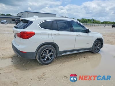 Trzecie zdjęcie samochodu z tyłu: 2017 BMW X1 XDRIVE28I VIN:WBXHT3C31H5F71759 - miniatura