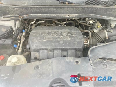 Zdjęcie 7 z 10 samochodu: 2012 HONDA PILOT TOURING VIN:5FNYF4H97CB019114 - miniatura