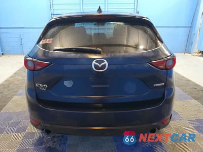 Zdjęcie 6 z 13 samochodu: 2021 MAZDA CX-5 GRAND TOURING VIN:JM3KFADM6M0333973 - miniatura