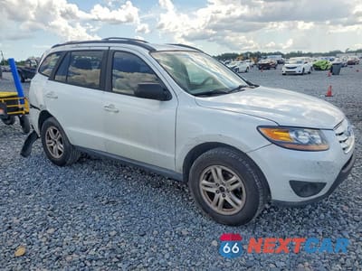 Czwarte zdjęcie samochodu z boku: 2010 HYUNDAI SANTA FE GLS VIN:5NMSG3AB4AH385490 - miniatura