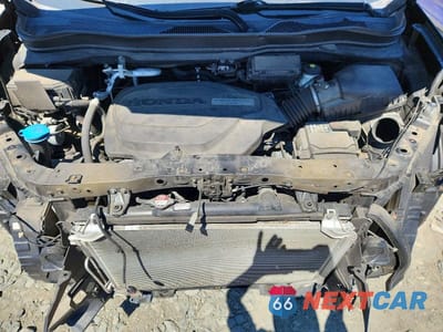 Zdjęcie 12 z 13 samochodu: 2019 HONDA PILOT TOURING VIN:5FNYF6H97KB087889 - miniatura