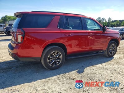 Trzecie zdjęcie samochodu z tyłu: 2021 CHEVROLET TAHOE K1500 Z71 VIN:1GNSKPKD9MR150354 - miniatura