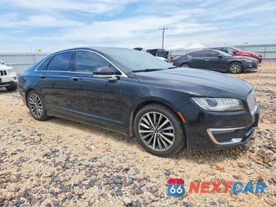 Czwarte zdjęcie samochodu z boku: 2017 LINCOLN MKZ SELECT VIN:3LN6L5C94HR660574 - miniatura