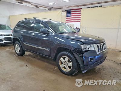 Czwarte zdjęcie samochodu z boku: 2013 JEEP GRAND CHEROKEE LAREDO VIN:1C4RJFAGXDC505311 - miniatura