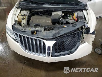 Zdjęcie 12 z 14 samochodu: 2015 LINCOLN MKX VIN:2LMDJ6JK8FBL34608 - miniatura