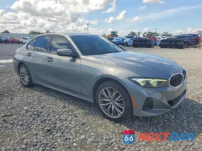 Czwarte zdjęcie samochodu z boku: 2023 BMW 330XI VIN:3MW89FF03P8D34815 - miniatura