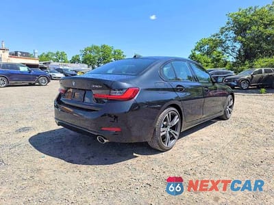 Czwarte zdjęcie samochodu z boku: 2023 BMW 330XI VIN:3MW89FF01P8D35865 - miniatura