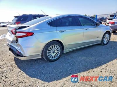 Trzecie zdjęcie samochodu z tyłu: 2014 FORD FUSION SE PHEV VIN:3FA6P0PU6ER269745 - miniatura