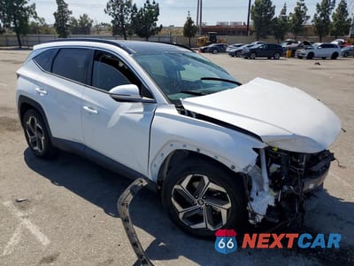 Czwarte zdjęcie samochodu z boku: 2022 HYUNDAI TUCSON LIMITED VIN:5NMJE3AE7NH101934 - miniatura