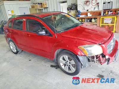 Czwarte zdjęcie samochodu z boku: 2011 DODGE CALIBER UPTOWN VIN:1B3CB9HB4BD114212 - miniatura
