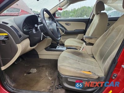 Zdjęcie 7 z 12 samochodu: 2010 HYUNDAI ELANTRA VIN:KMHDU4AD5AU831174 - miniatura