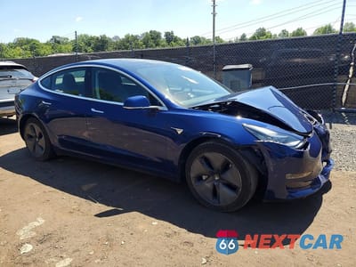 Czwarte zdjęcie samochodu z boku: 2020 TESLA MODEL 3 VIN:5YJ3E1EA7LF658460 - miniatura